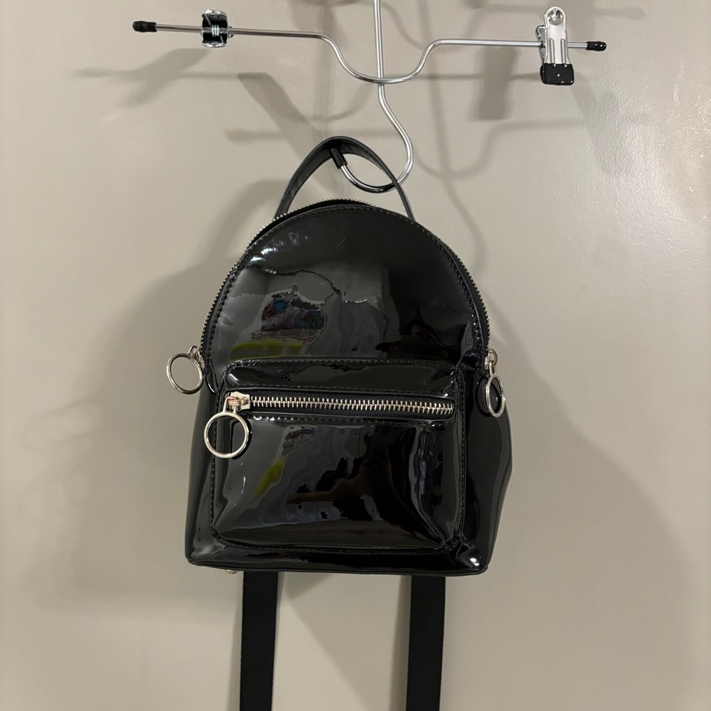 BP x Claudia Sulewski collab faux patent leather black backpack